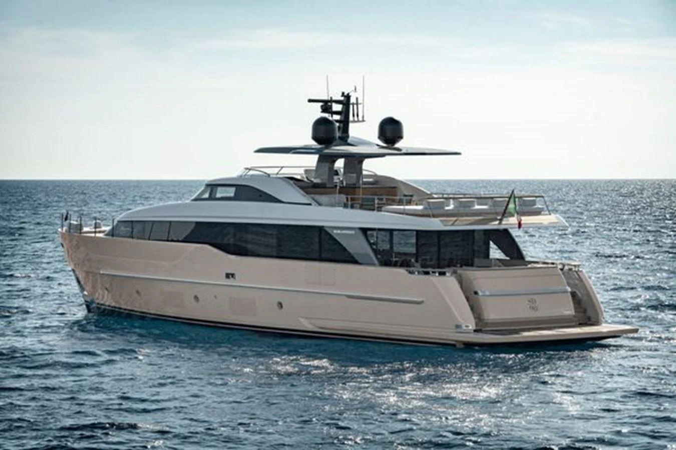 A sleek and modern yacht cruising on calm waters under a clear sky. aboard 2025 SANLORENZO SD90 #180 Yacht for Sale