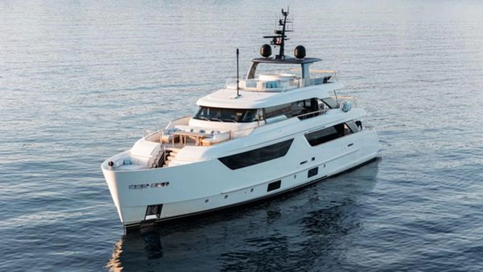 A sleek and modern yacht glides gracefully on calm waters. aboard 2022 SANLORENZO SD118 Yacht for Sale