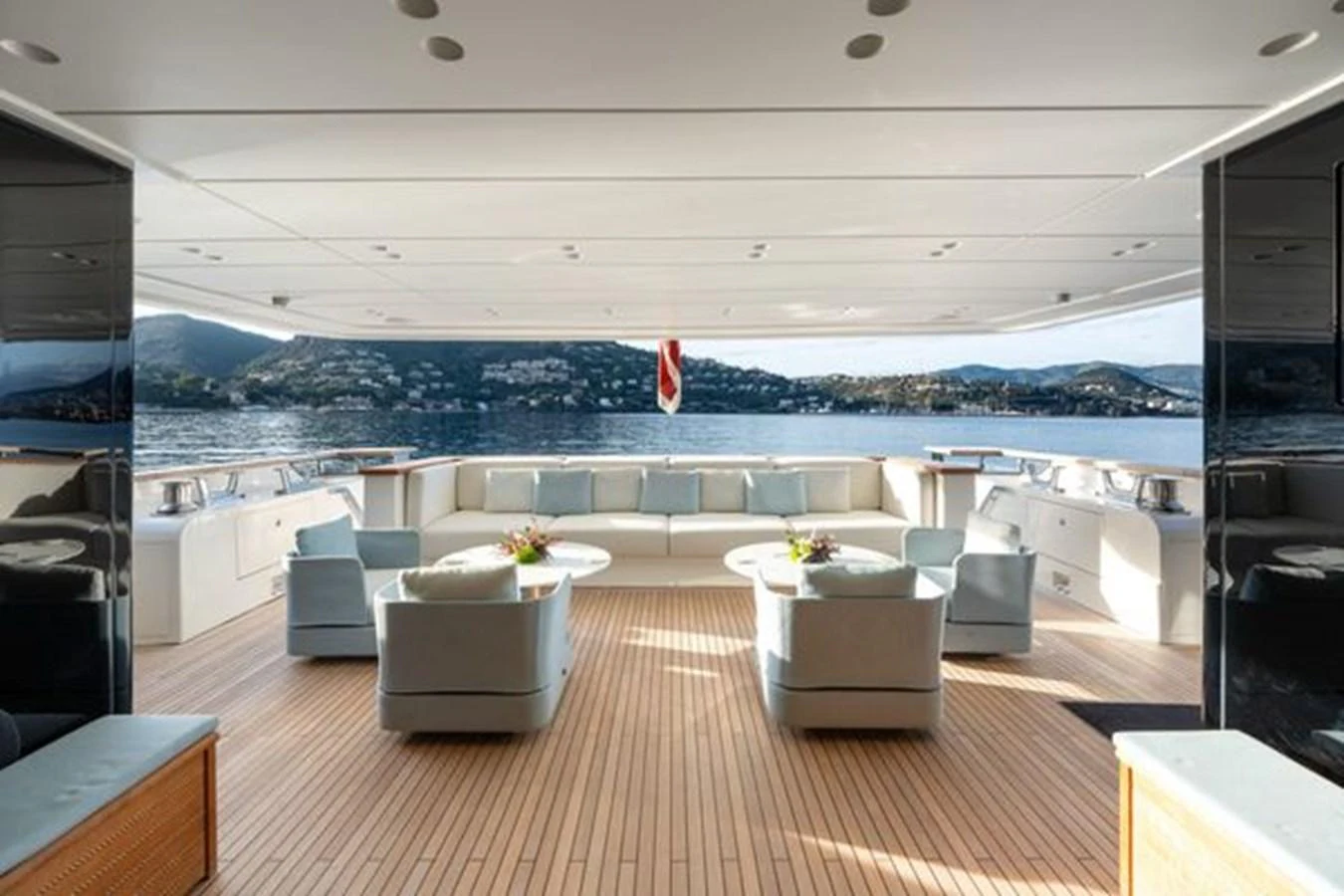 The aft deck offers a spacious and comfortable seating area with stunning views of the surrounding waters. aboard 2022 SANLORENZO SD118 Yacht for Sale