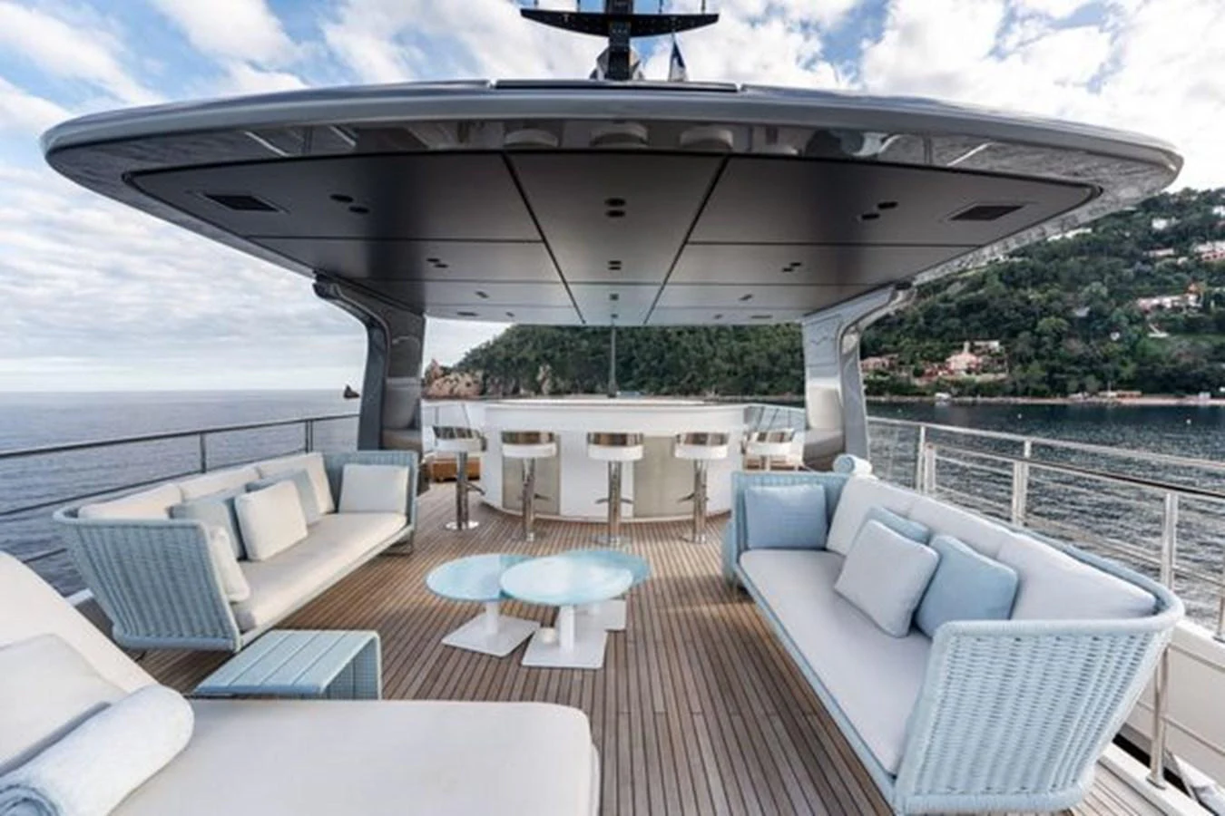 The flybridge offers a spacious and luxurious outdoor seating area with stunning views. aboard 2022 SANLORENZO SD118 Yacht for Sale