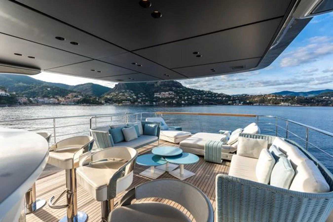 The aft deck offers a luxurious outdoor seating area with stunning views of the surrounding water and landscape. aboard 2022 SANLORENZO SD118 Yacht for Sale