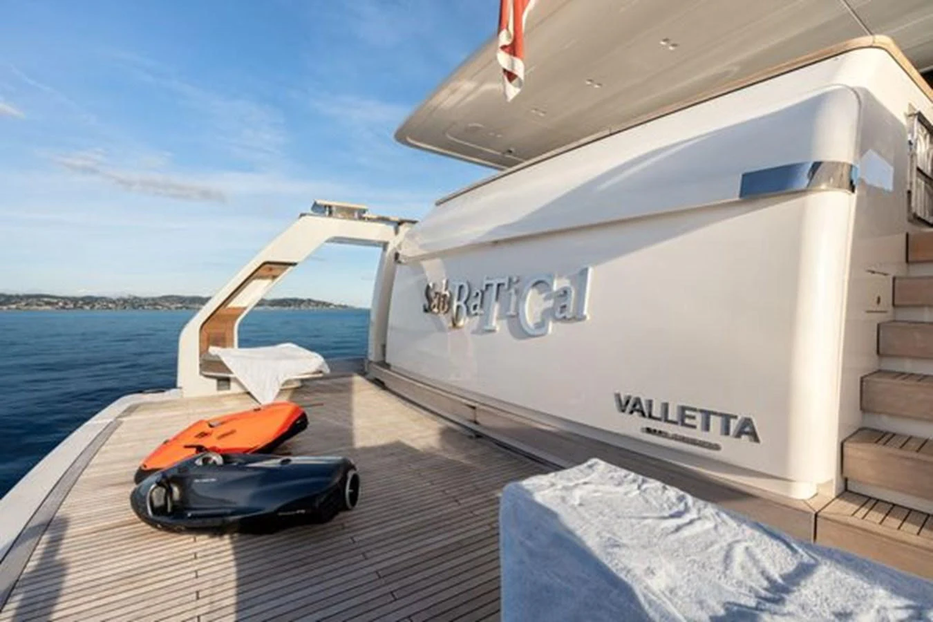 The aft deck features a spacious layout with water toys ready for adventure. aboard 2022 SANLORENZO SD118 Yacht for Sale