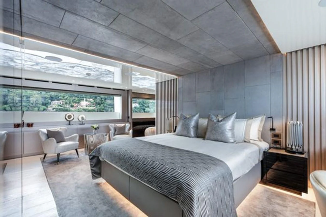 The master stateroom features a luxurious bed with elegant decor and ample natural light. aboard 2022 SANLORENZO SD118 Yacht for Sale