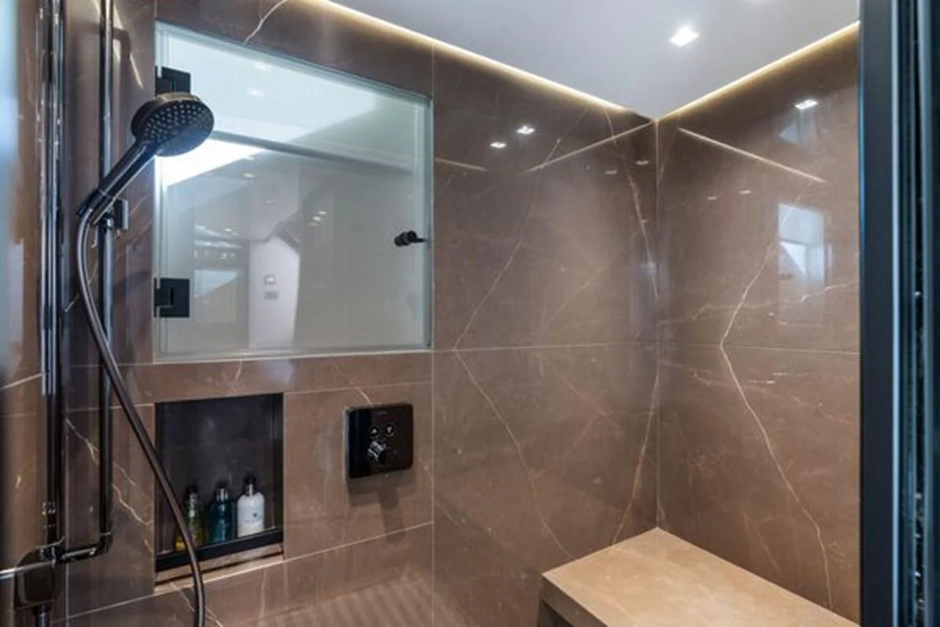 The yacht's bathroom features a sleek, modern design with luxurious finishes. aboard 2022 SANLORENZO SD118 Yacht for Sale