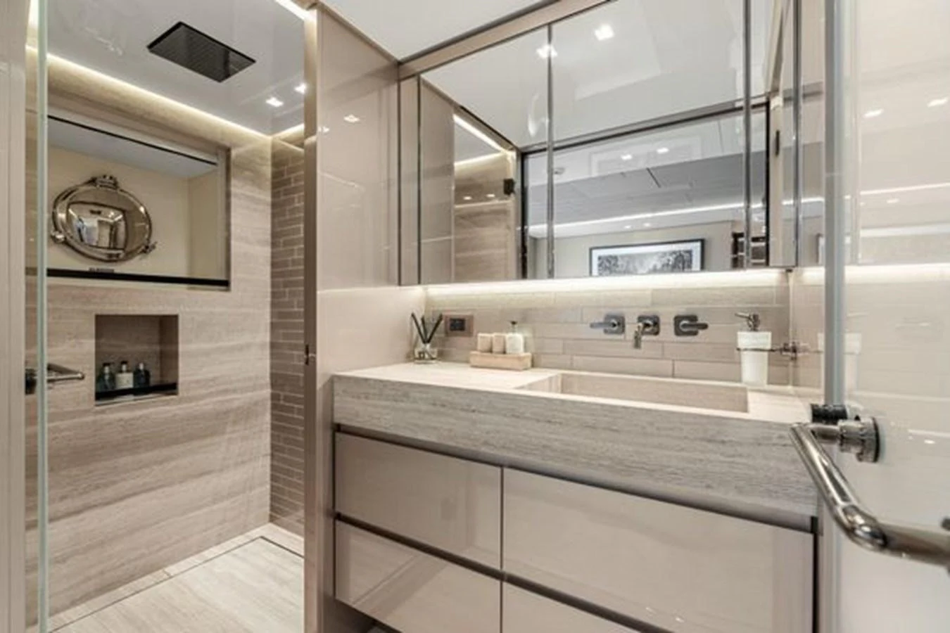A luxurious yacht bathroom featuring modern fixtures and elegant design. aboard 2022 SANLORENZO SD118 Yacht for Sale