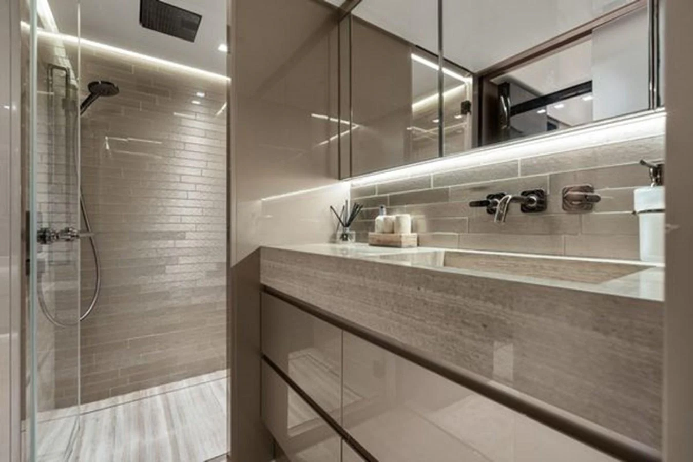 The yacht's bathroom features a sleek, modern design with high-end fixtures and ample lighting. aboard 2022 SANLORENZO SD118 Yacht for Sale