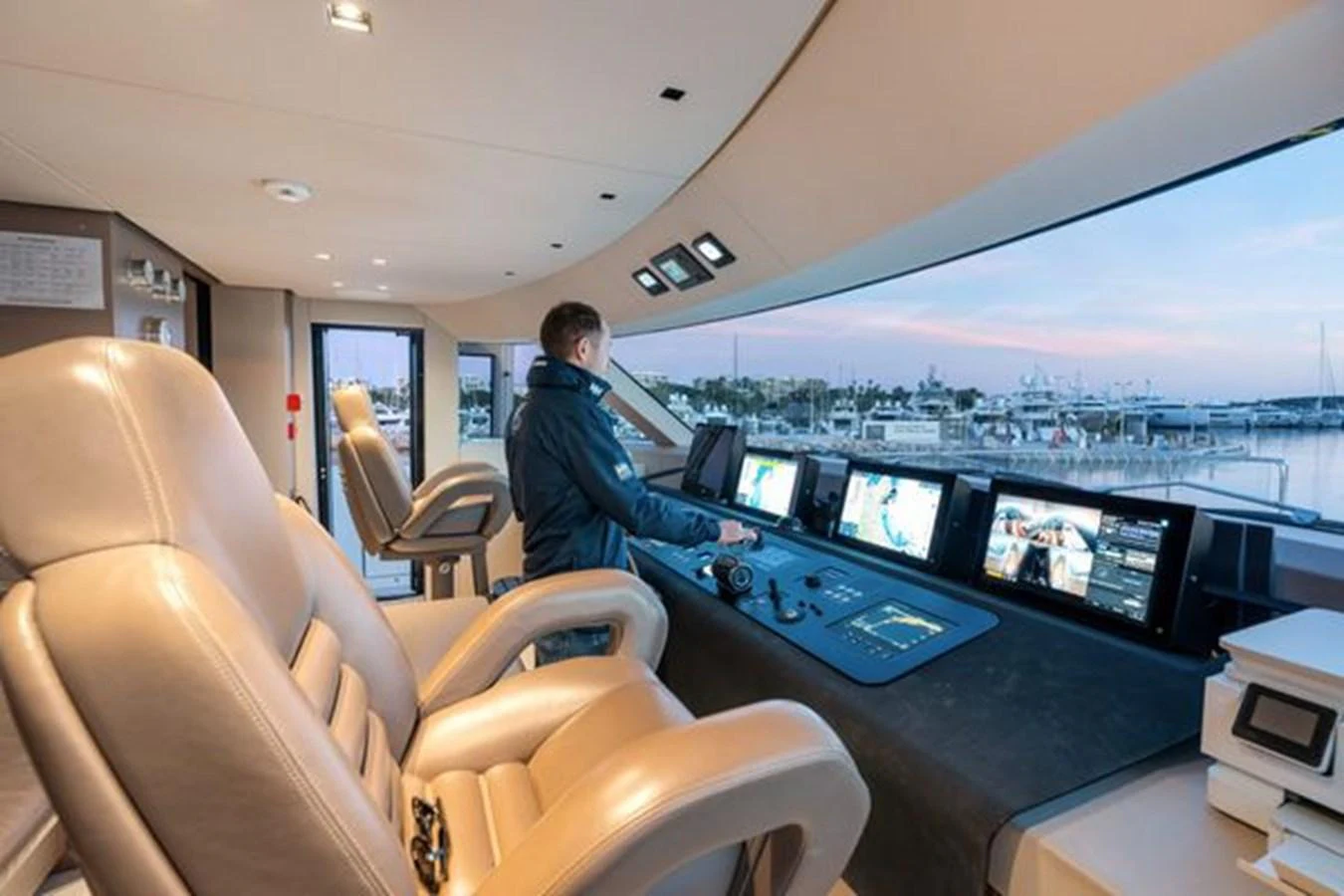 The helm station offers a commanding view with state-of-the-art navigation equipment and luxurious seating. aboard 2022 SANLORENZO SD118 Yacht for Sale