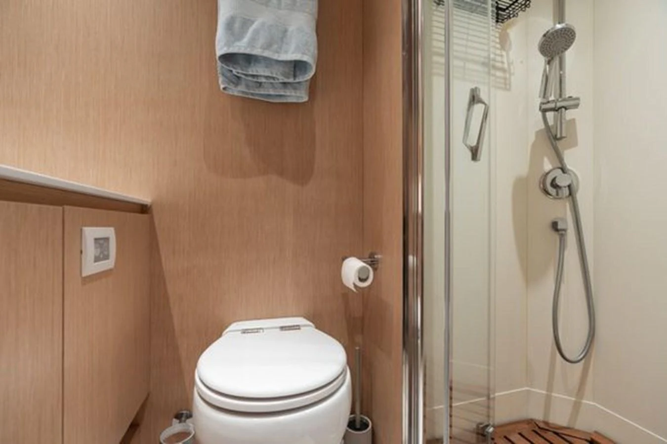 The yacht's bathroom features modern fixtures and a compact design. aboard 2022 SANLORENZO SD118 Yacht for Sale