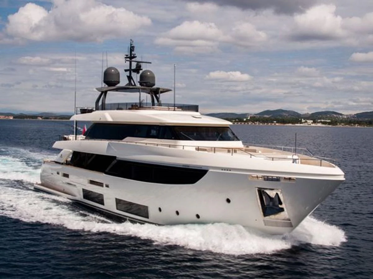 a white yacht on the water aboard SK Yacht for Sale