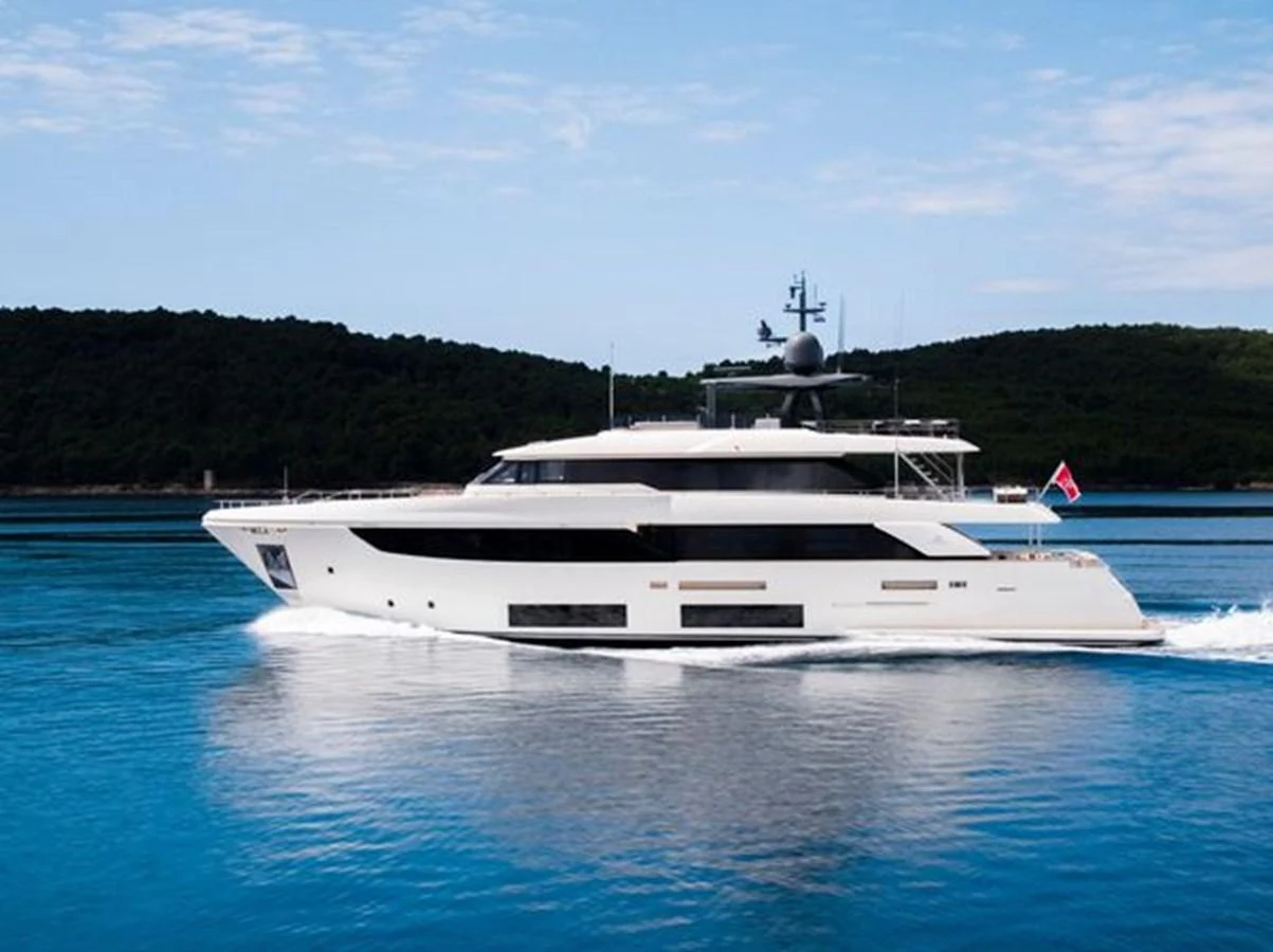 a white yacht on the water aboard SK Yacht for Sale