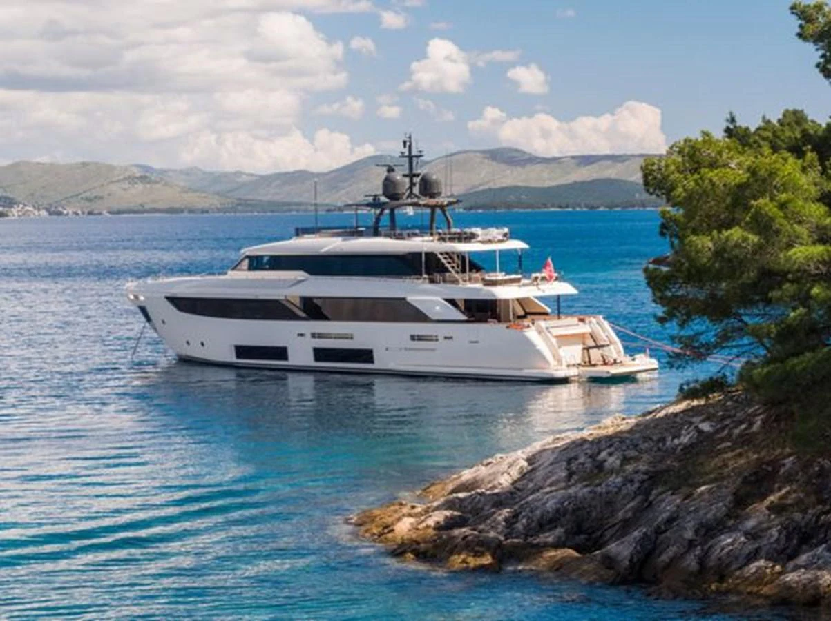 a white yacht in the water aboard SK Yacht for Sale