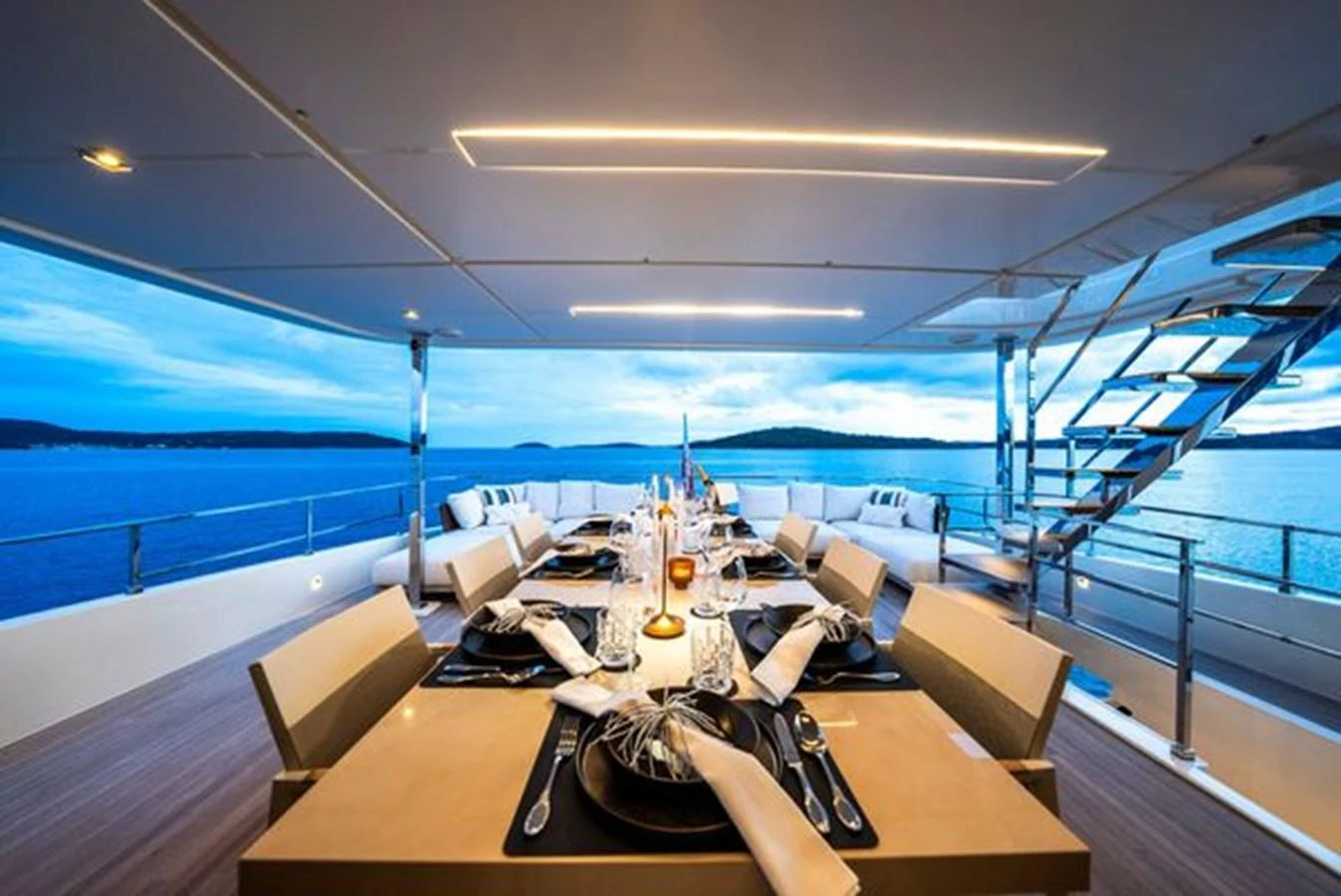a space ship with a large ship in the background aboard SK Yacht for Sale