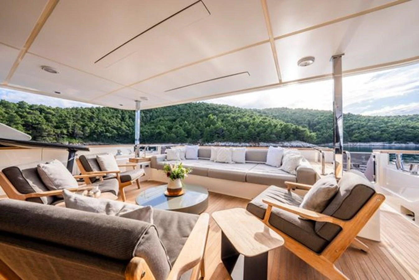 a living room with a large window aboard SK Yacht for Sale