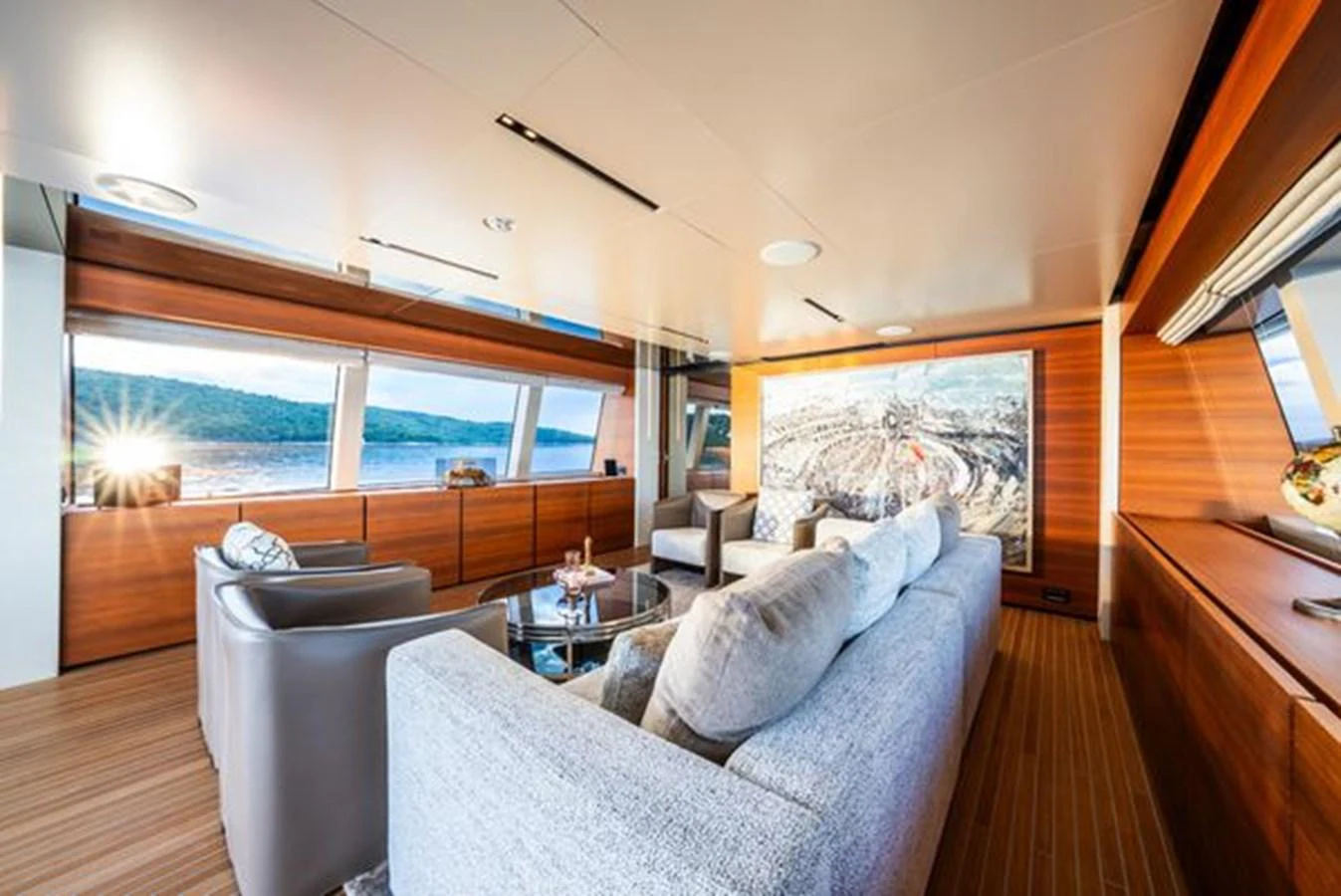 a living room with a large window aboard SK Yacht for Sale