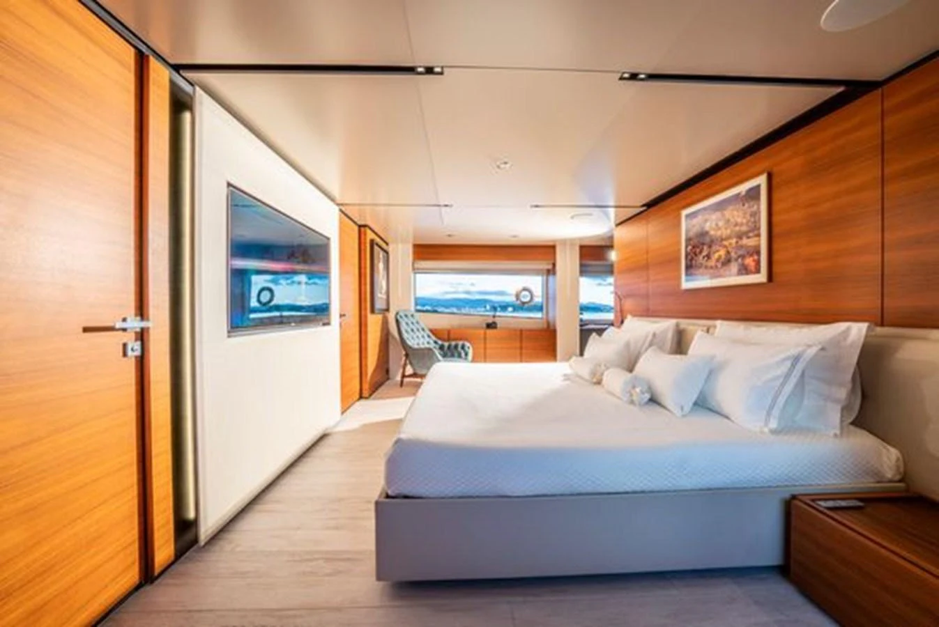 a bed in a room aboard SK Yacht for Sale