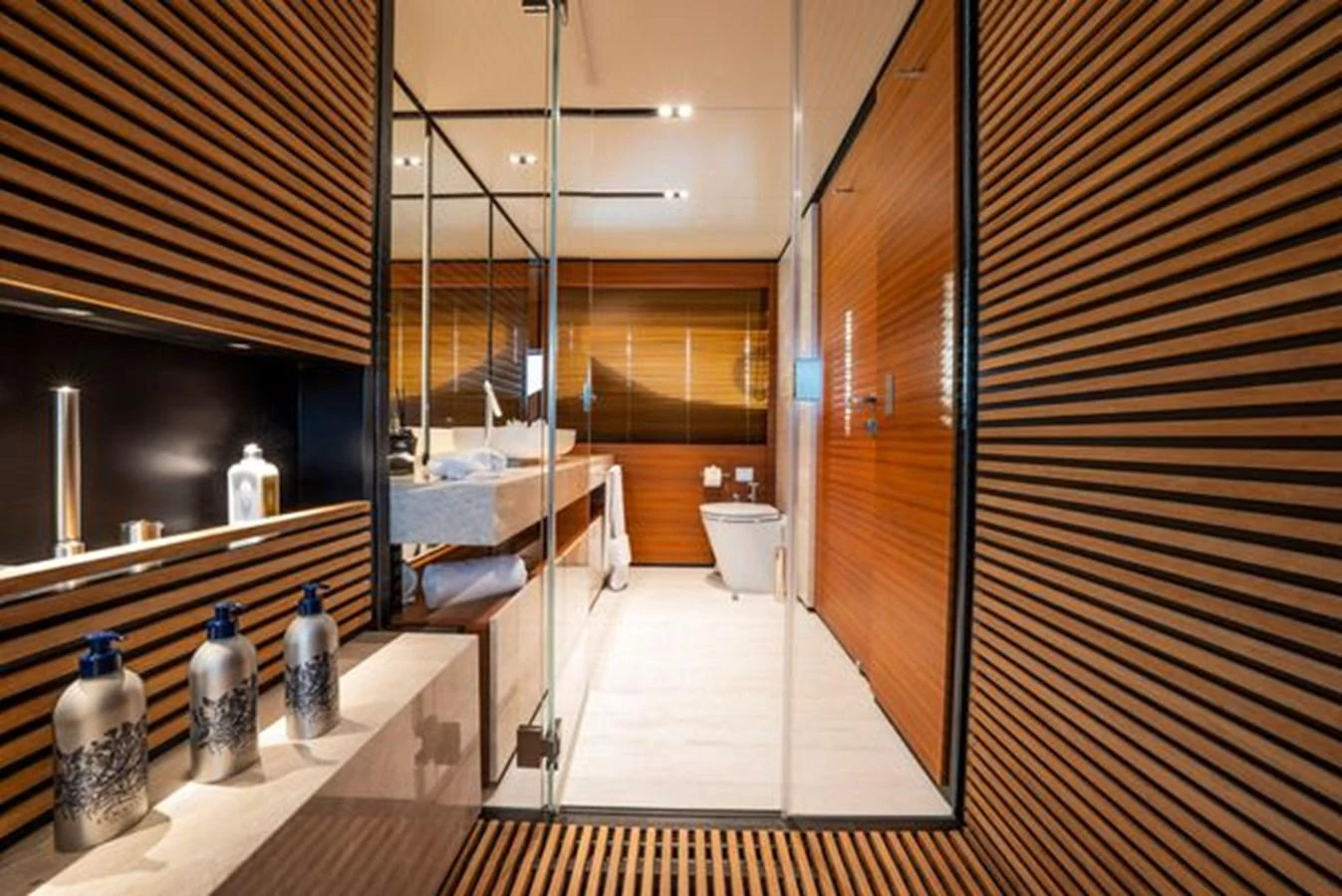 a room with a glass wall aboard SK Yacht for Sale
