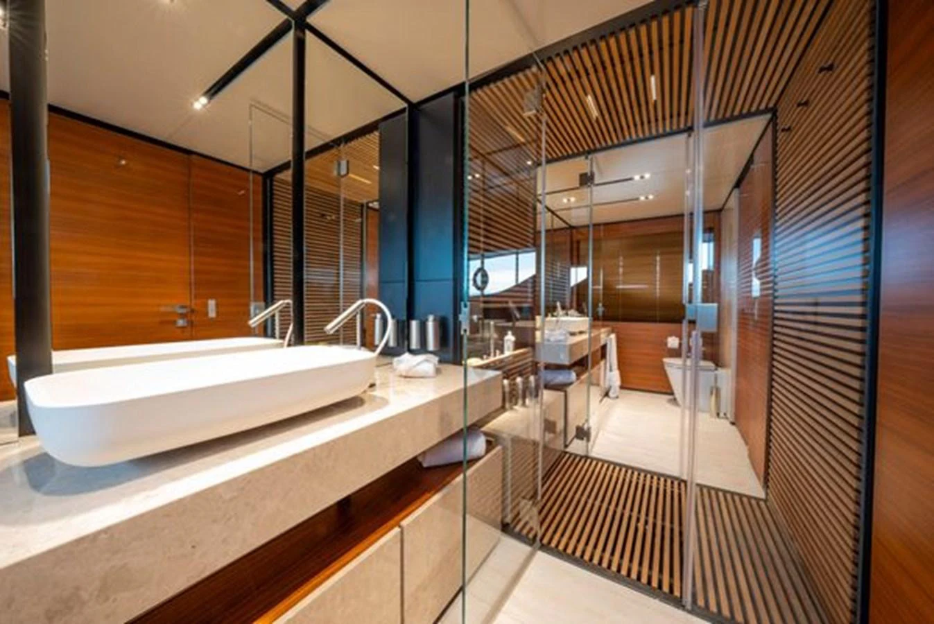 a large bathroom with a large tub aboard SK Yacht for Sale