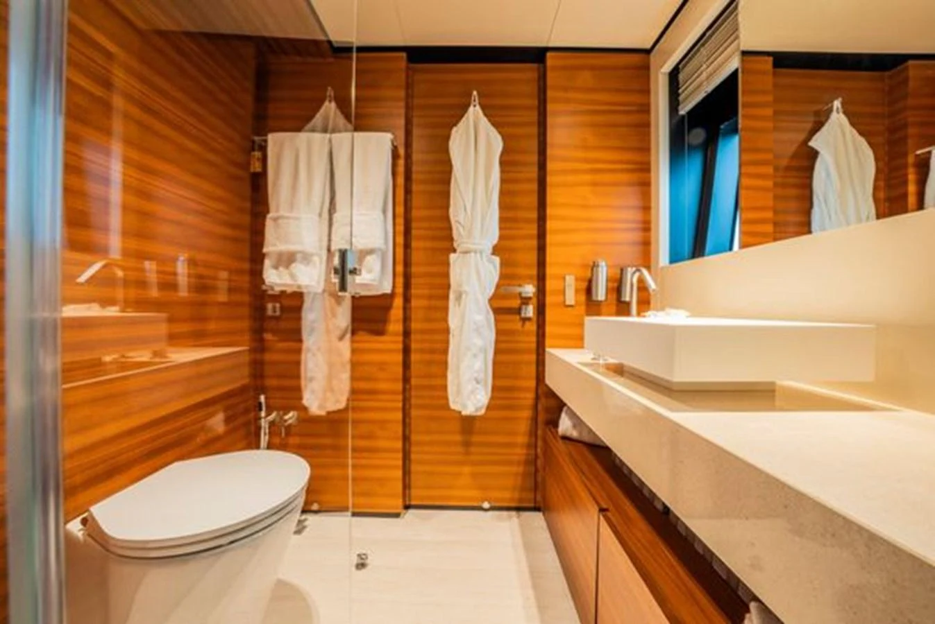a bathroom with a sink and toilet aboard SK Yacht for Sale