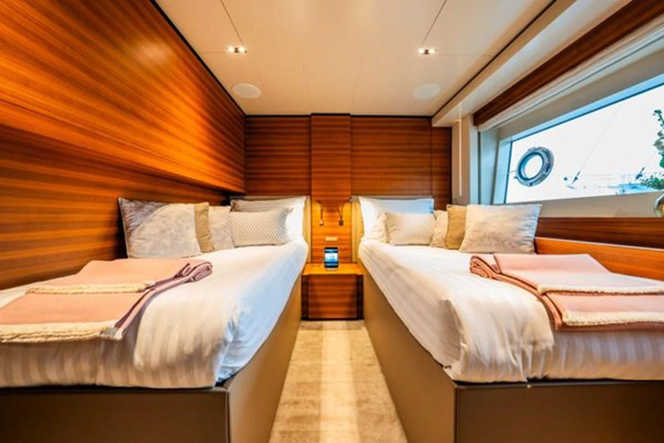 a room with two beds aboard SK Yacht for Sale