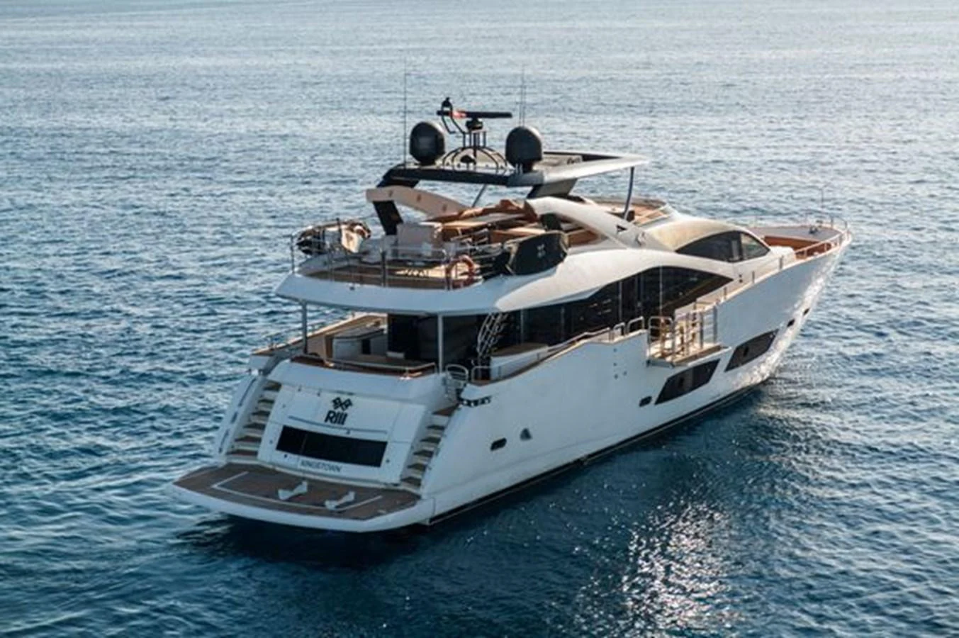 A sleek and modern yacht cruising on calm waters, showcasing its elegant design and spacious decks. aboard 2015 SUNSEEKER 28M RIII Yacht for Sale