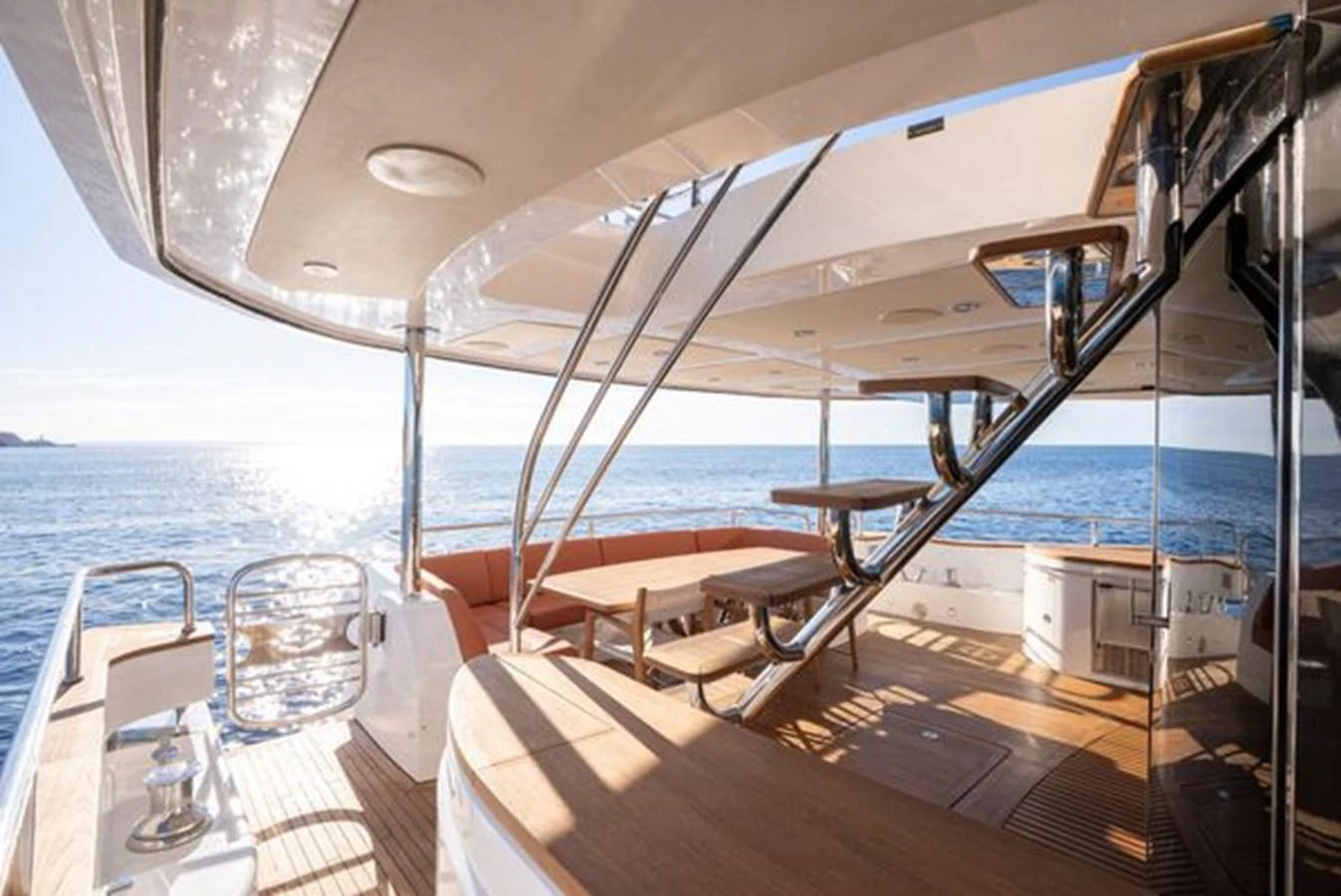 The aft deck offers a spacious and inviting area for relaxation and dining with stunning ocean views. aboard 2015 SUNSEEKER 28M RIII Yacht for Sale