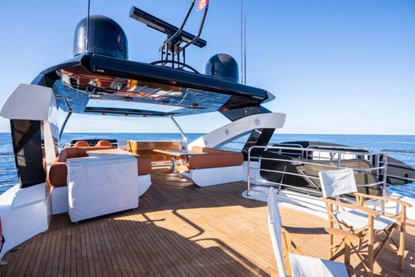 The flybridge offers a spacious and luxurious outdoor area with ample seating and stunning ocean views. aboard 2015 SUNSEEKER 28M RIII Yacht for Sale