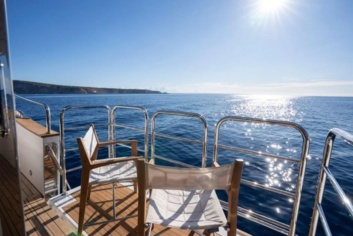 The aft deck offers a serene seating area with stunning ocean views. aboard 2015 SUNSEEKER 28M RIII Yacht for Sale