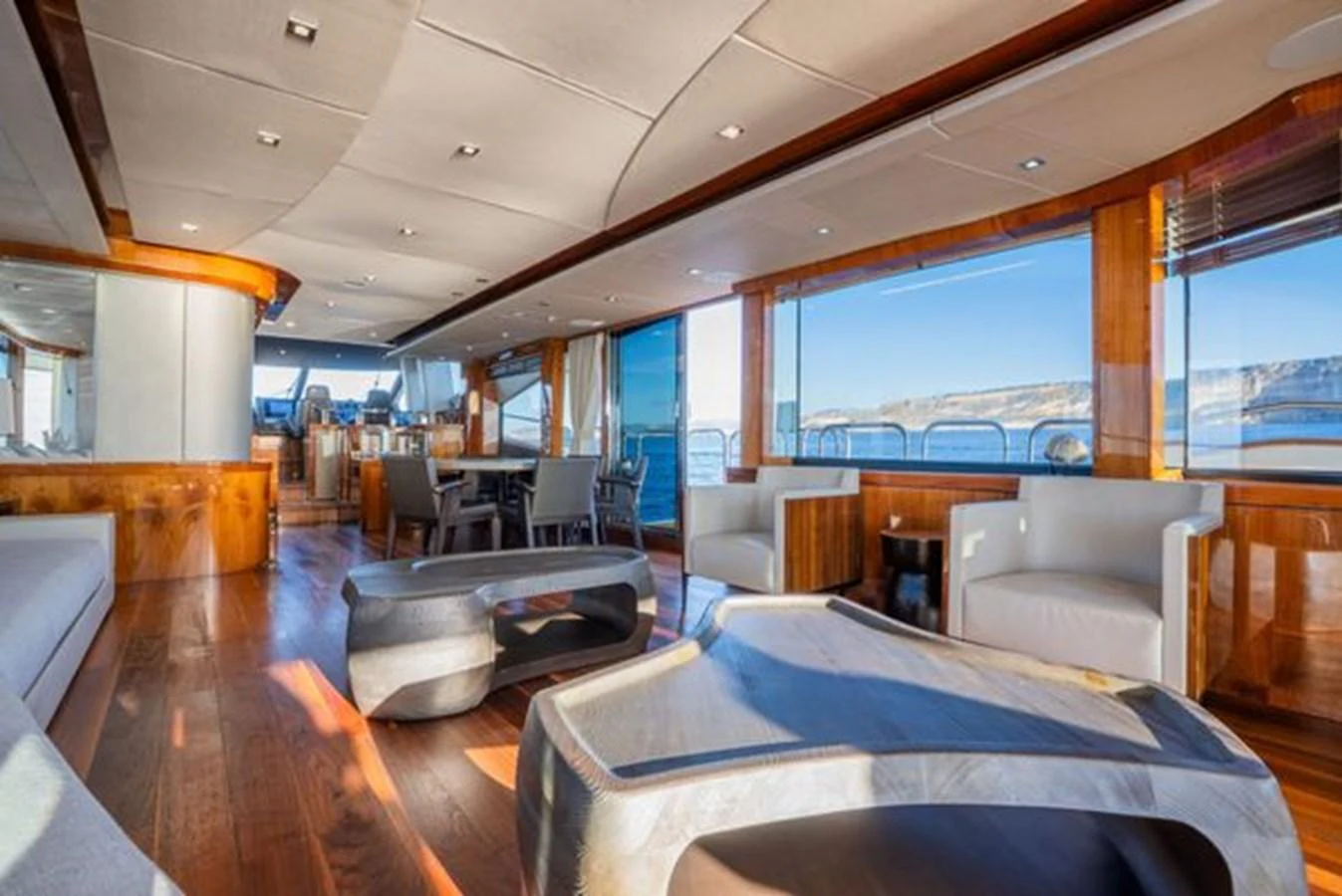 The yacht's salon features luxurious seating and expansive windows offering stunning views. aboard 2015 SUNSEEKER 28M RIII Yacht for Sale