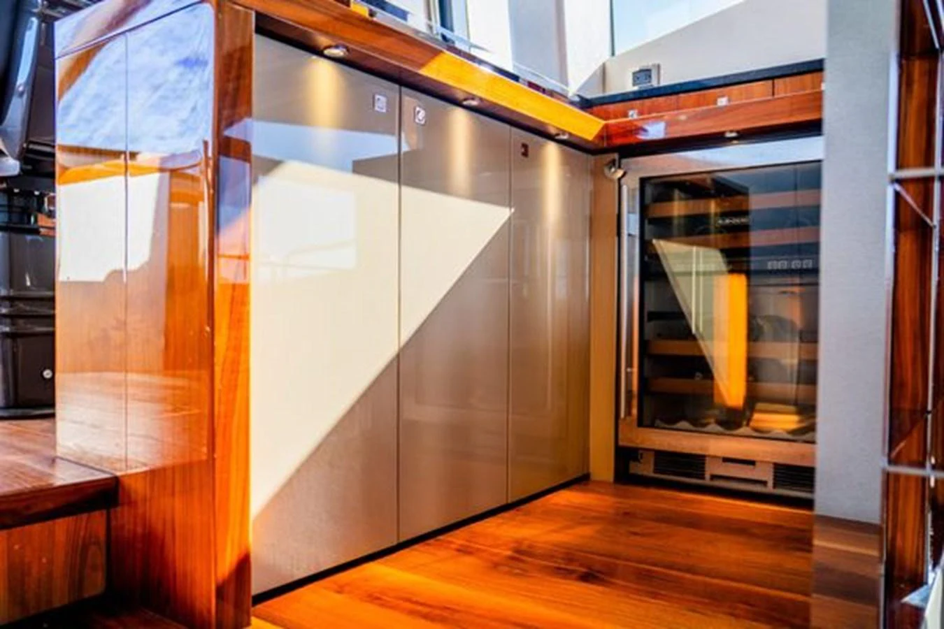 The yacht's interior features a sleek and modern design with polished wood finishes and ample natural light. aboard 2015 SUNSEEKER 28M RIII Yacht for Sale