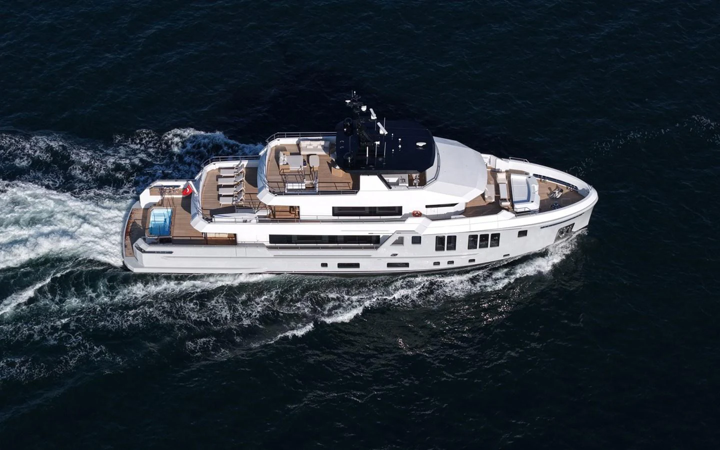 A sleek and modern yacht cruising through the water, showcasing its elegant design and spacious decks. aboard BEE EXPLORER YACHT Yacht for Sale