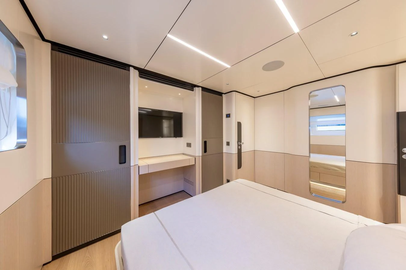 The stateroom features modern design with ample storage and a sleek, minimalist aesthetic. aboard BEE EXPLORER YACHT Yacht for Sale
