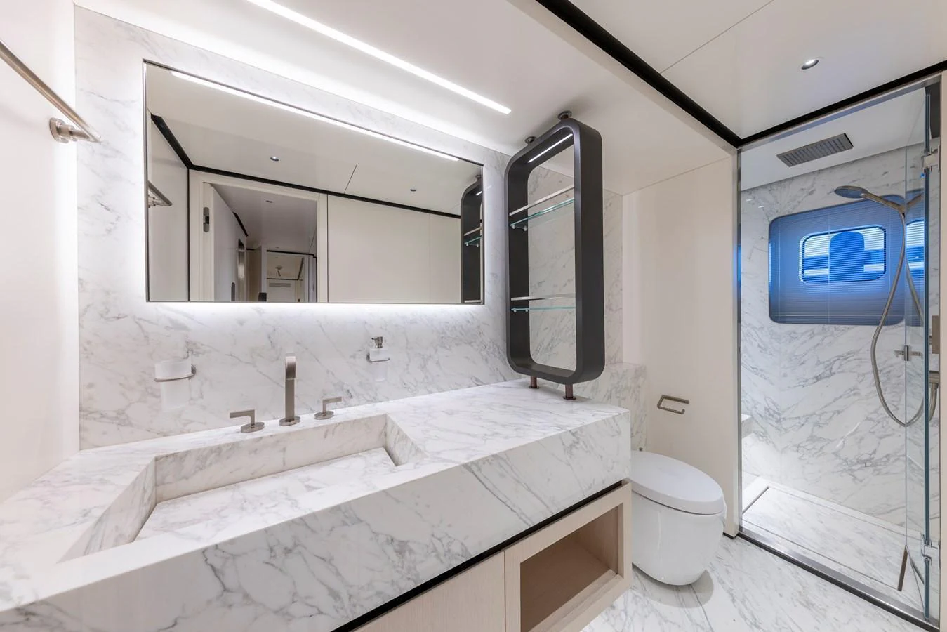 The yacht's bathroom features elegant marble surfaces and modern fixtures. aboard BEE EXPLORER YACHT Yacht for Sale