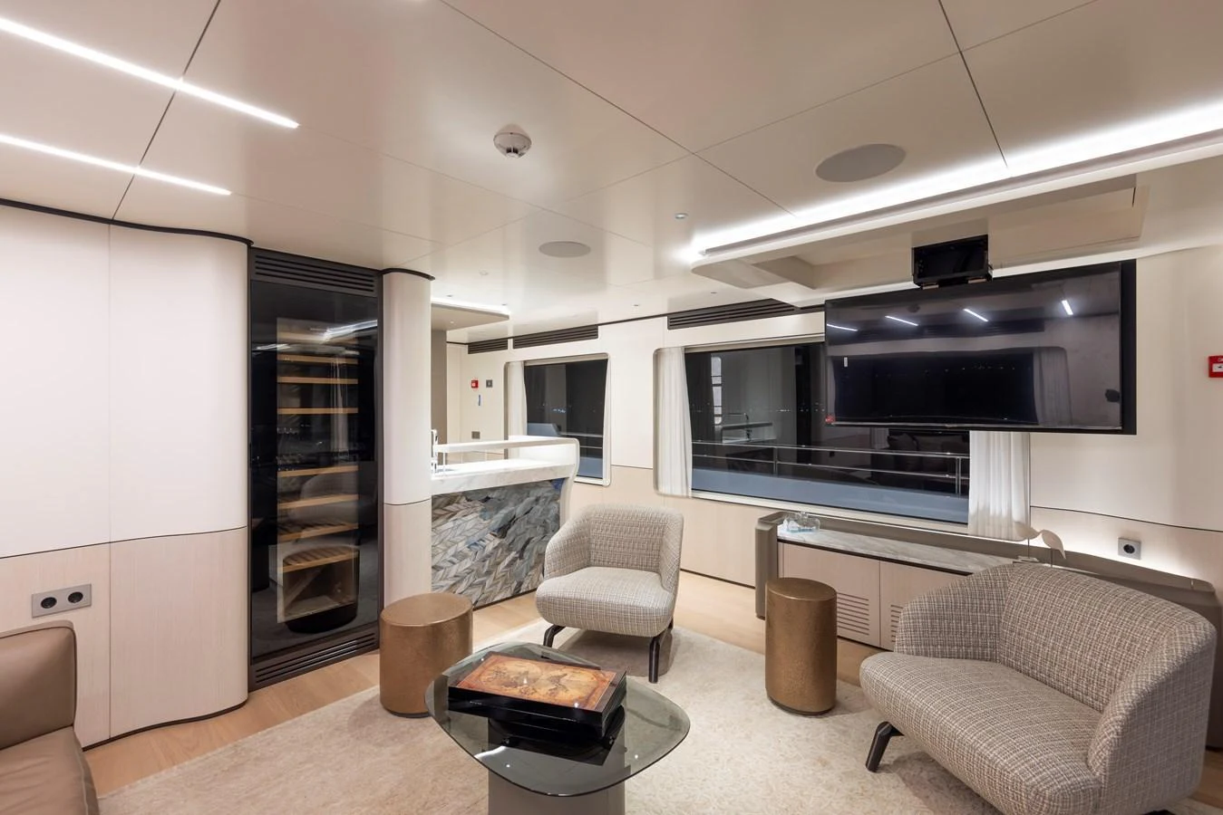 The yacht's salon features modern furnishings and a sleek design, creating a comfortable and stylish living space. aboard BEE EXPLORER YACHT Yacht for Sale
