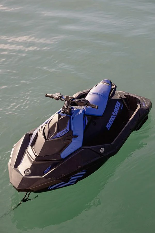 A sleek jet ski floats on calm waters, ready for adventure. aboard HOSHI Yacht for Sale