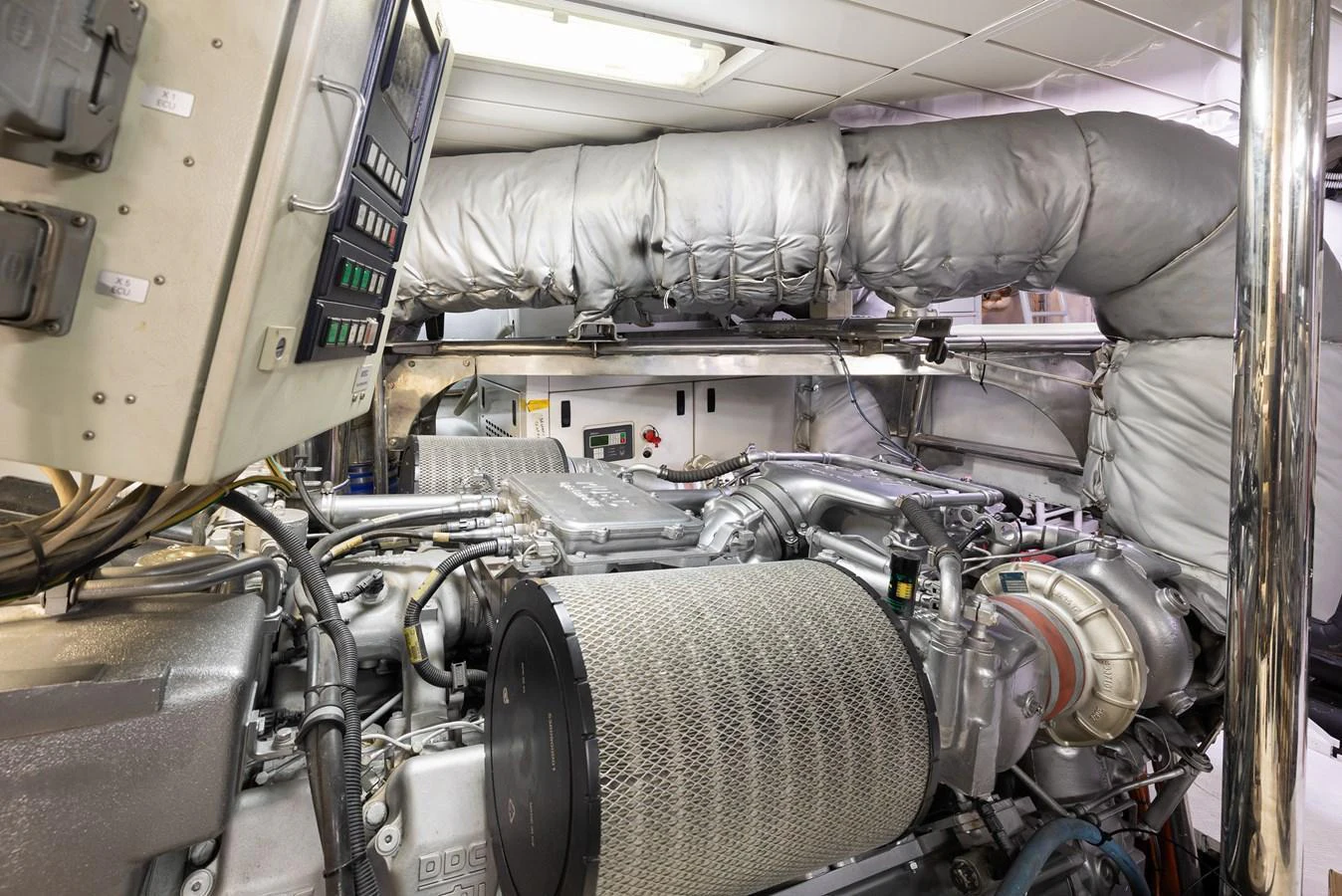 The image showcases the yacht's engine room with advanced machinery and equipment. aboard HOSHI Yacht for Sale