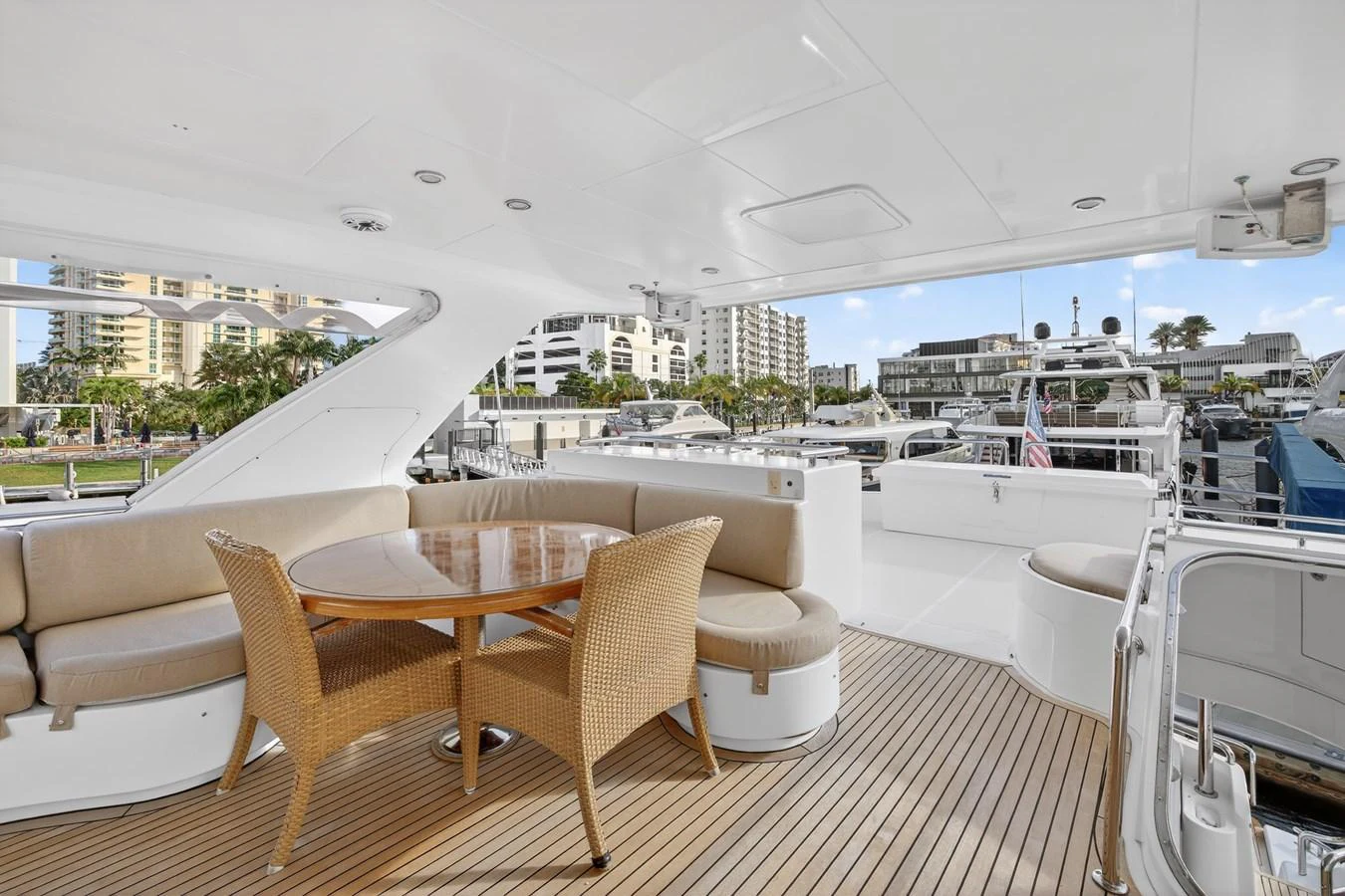 a deck with chairs and tables on it aboard ARLENE Yacht for Sale