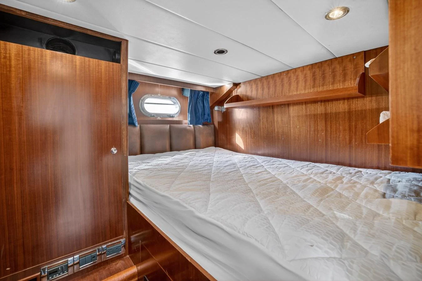 a bed in a room aboard ARLENE Yacht for Sale