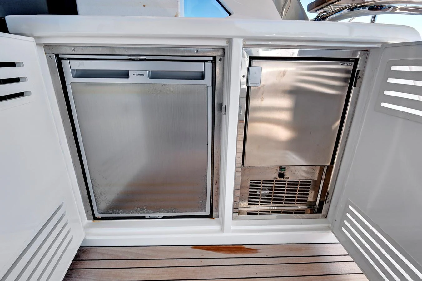 This image showcases the yacht's built-in refrigeration units, highlighting practical onboard amenities. aboard MISTY K Yacht for Sale