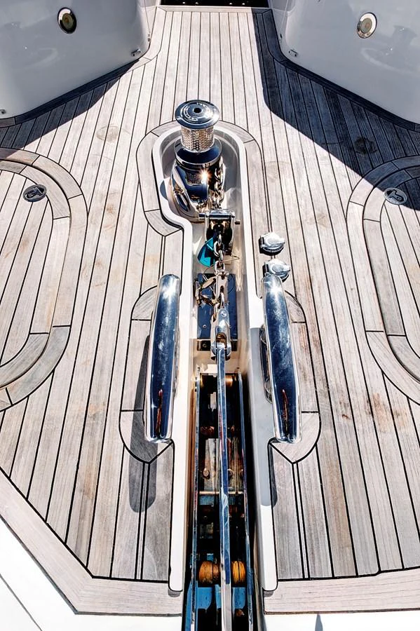 A close-up view of the yacht's anchor winch system on the deck. aboard MISTY K Yacht for Sale