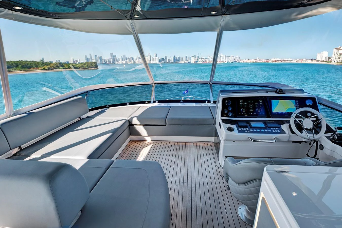 The helm area offers a panoramic view with comfortable seating and state-of-the-art navigation equipment. aboard MISTY K Yacht for Sale