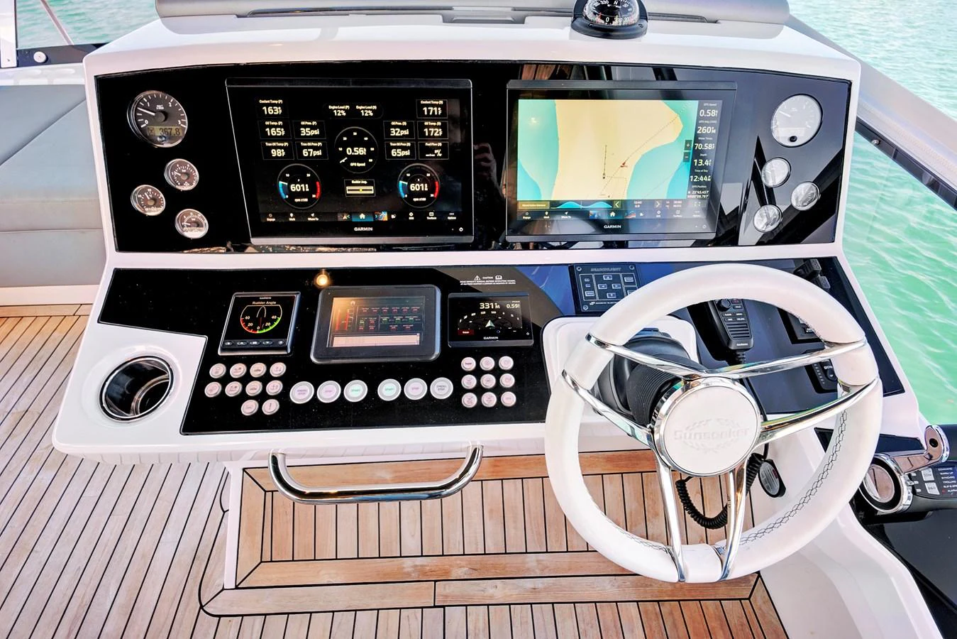 The helm station features advanced navigation and control systems with a sleek, modern design. aboard MISTY K Yacht for Sale