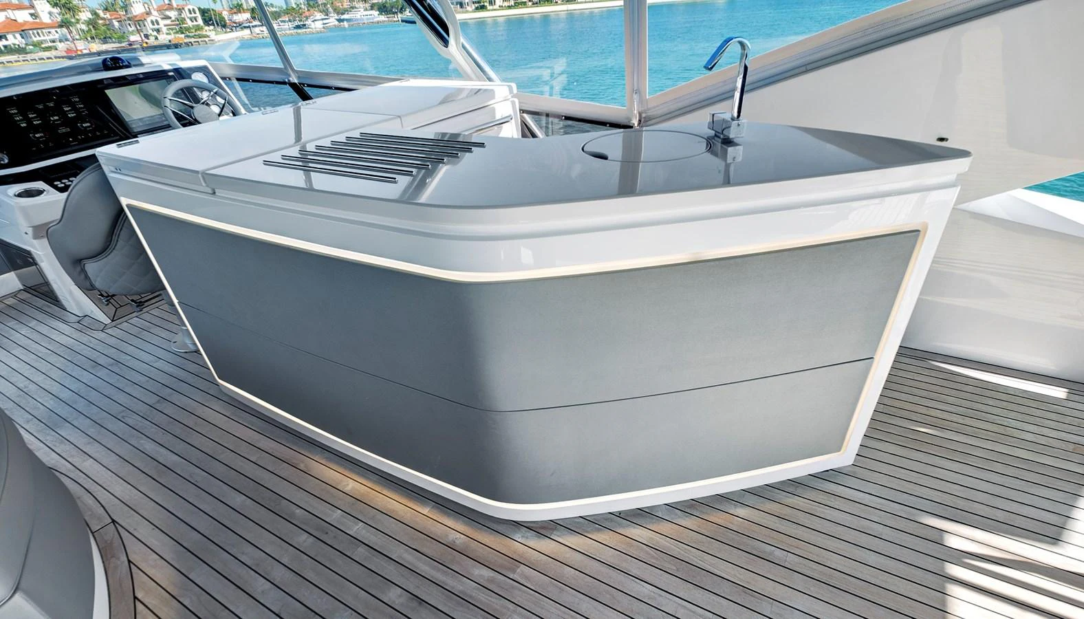 The flybridge features a sleek bar area with a modern design and stunning views of the water. aboard MISTY K Yacht for Sale