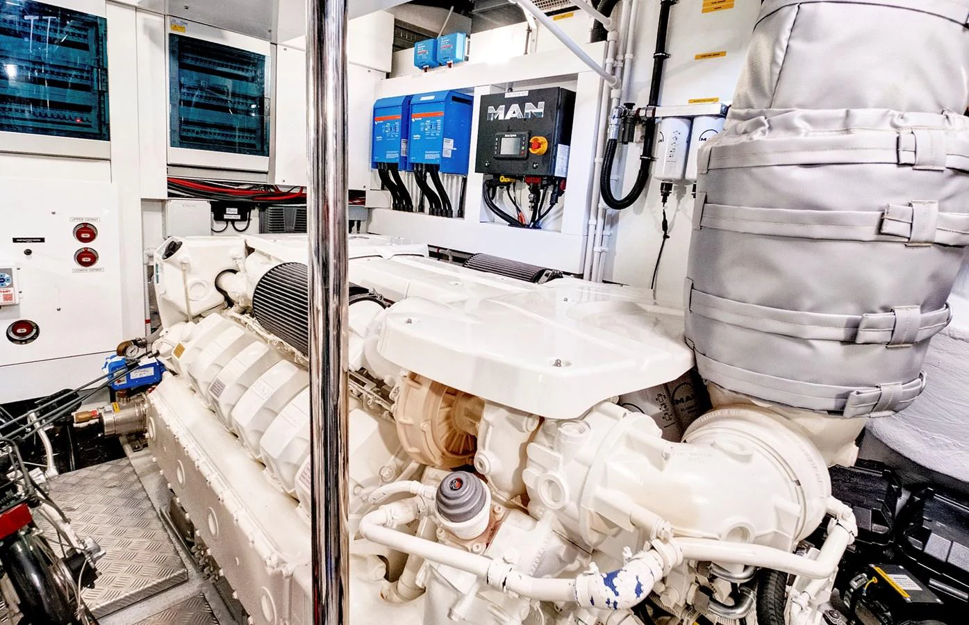 The image showcases the yacht's pristine engine room with advanced machinery and equipment. aboard MISTY K Yacht for Sale