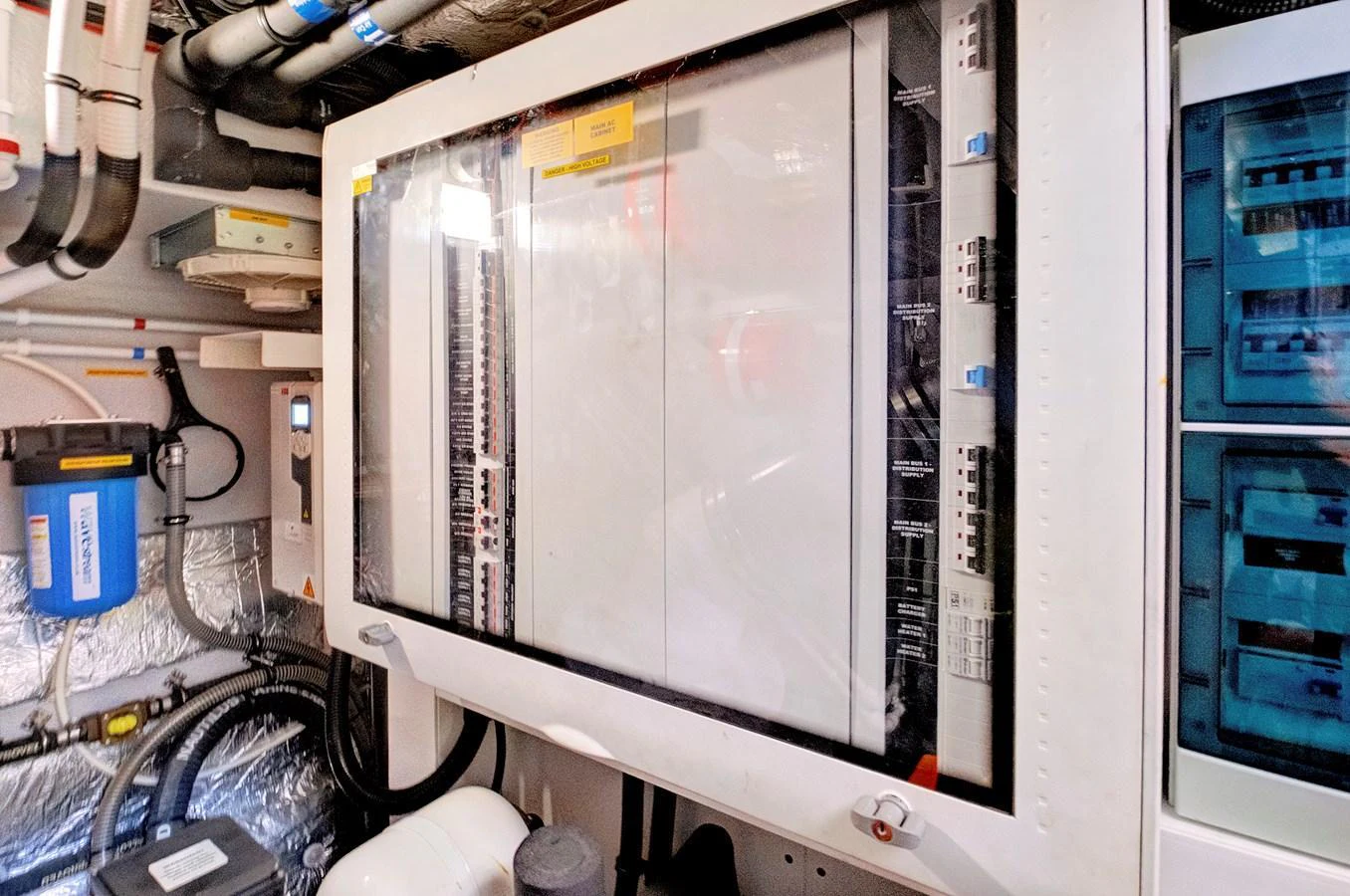 The image showcases the technical and mechanical components within the yacht's engine room. aboard MISTY K Yacht for Sale