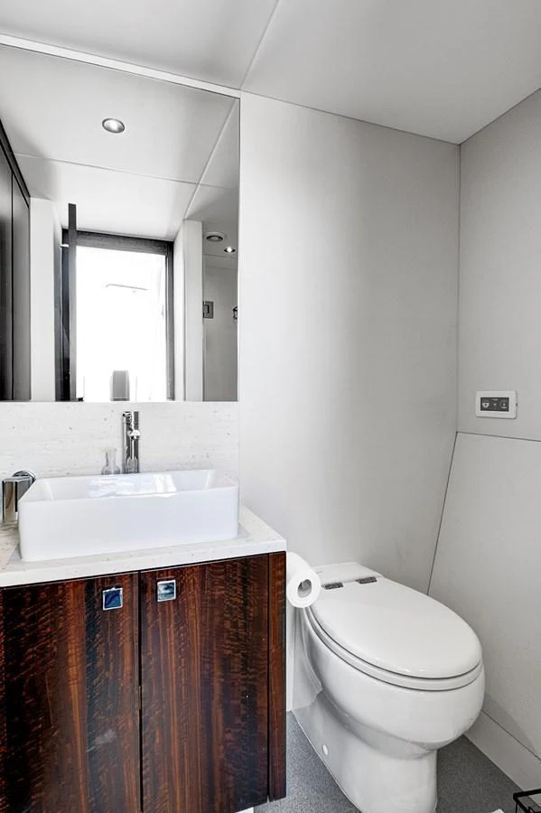 The yacht's bathroom features modern fixtures and a sleek design. aboard MISTY K Yacht for Sale