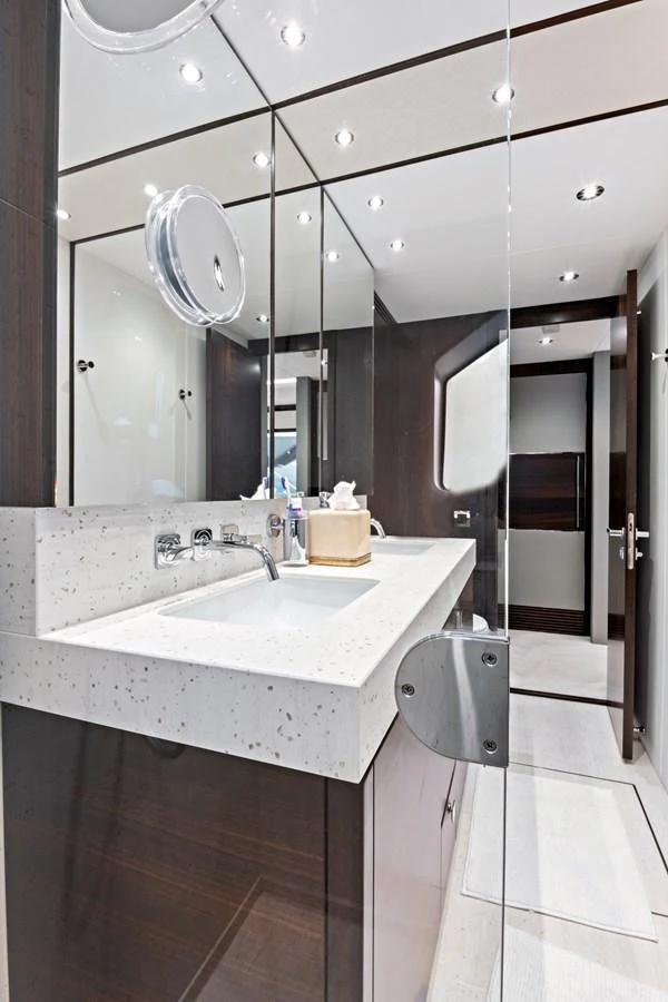 The yacht's bathroom features modern fixtures and elegant design. aboard MISTY K Yacht for Sale
