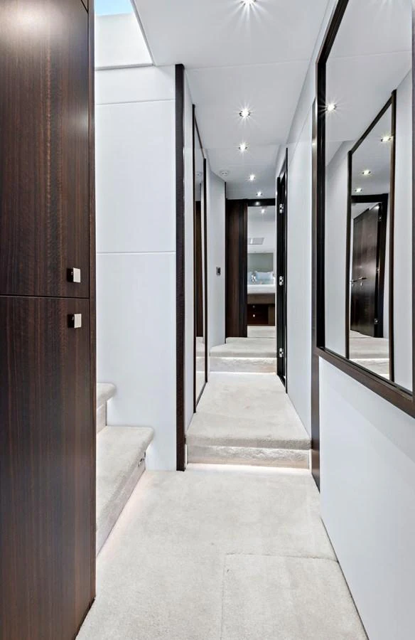 A sleek and modern hallway with elegant finishes and ample lighting. aboard MISTY K Yacht for Sale