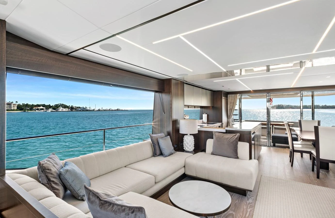The salon offers a spacious and elegant living area with panoramic views of the sea. aboard MISTY K Yacht for Sale