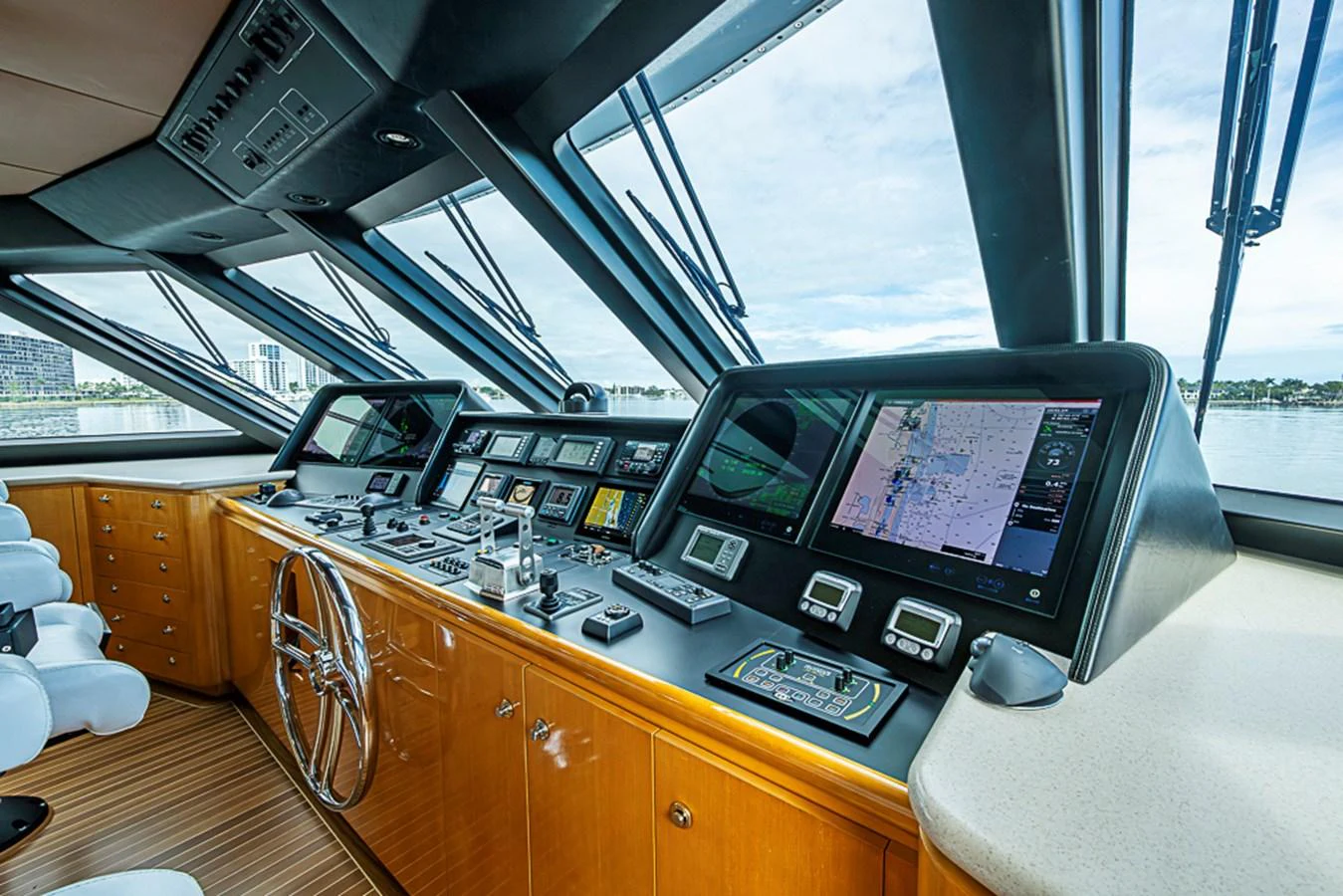The helm station features state-of-the-art navigation equipment and a panoramic view. aboard PROBABILITY Yacht for Sale