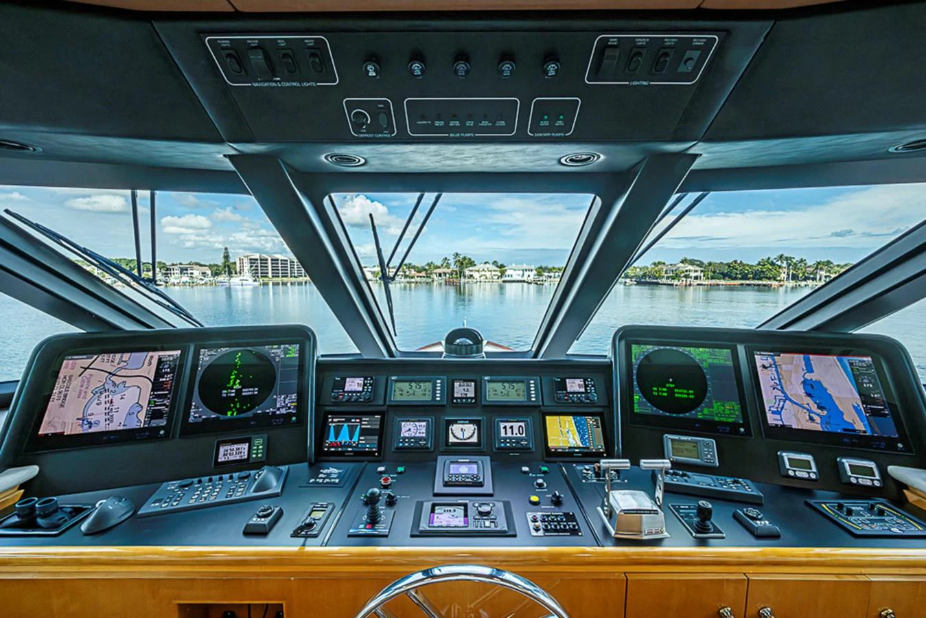 The helm station offers advanced navigation systems with panoramic views. aboard PROBABILITY Yacht for Sale